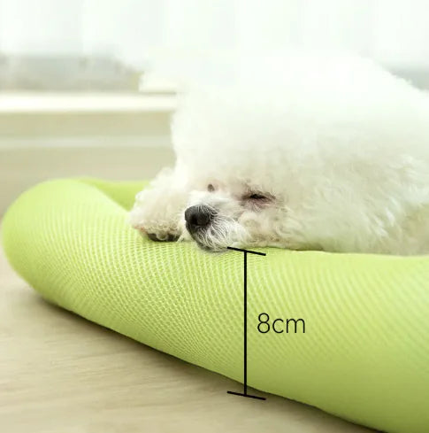 Cat lounging on cooling mat