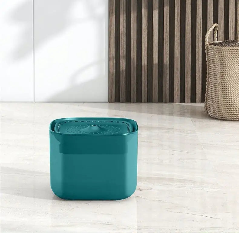 Cat water fountain on kitchen floor
